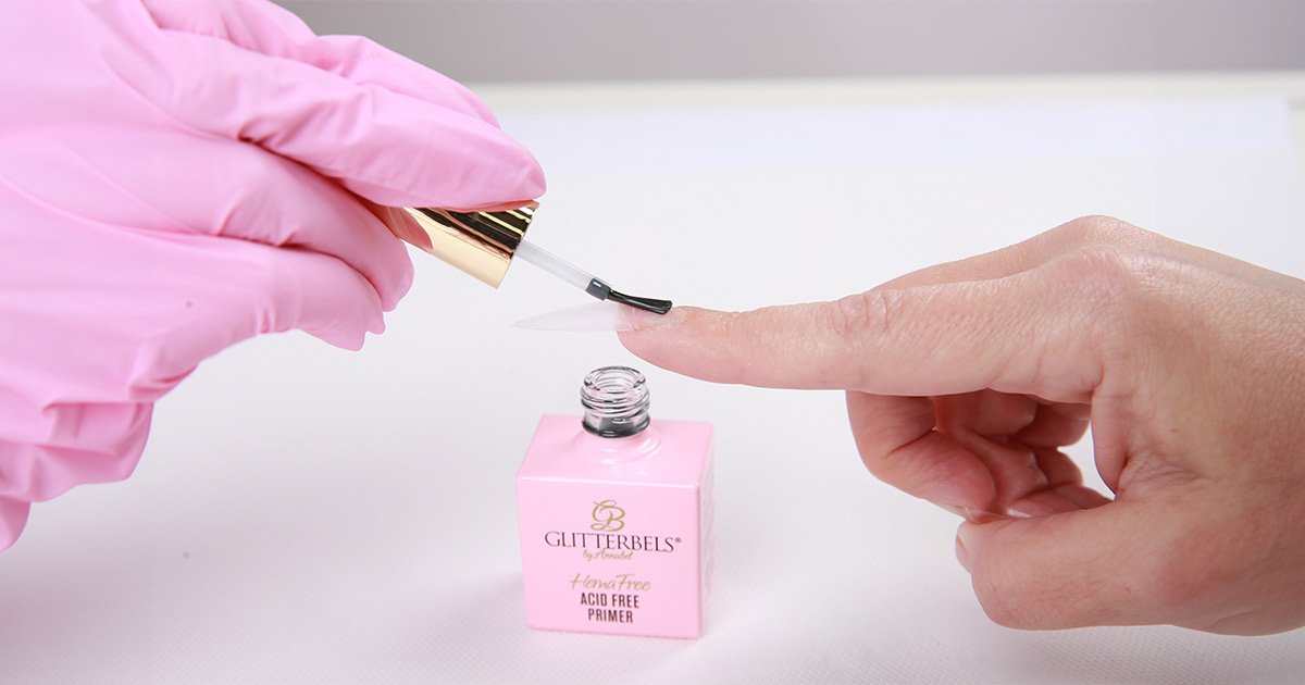 Glitterbels Hema Free Acid Free Primer being applied to nails